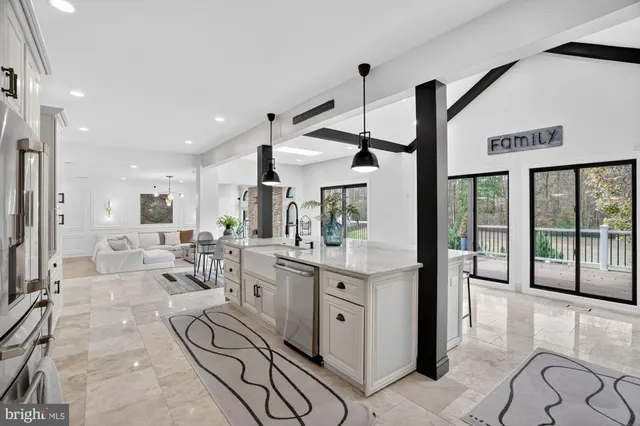 a view of an entryway with wooden floor and windows