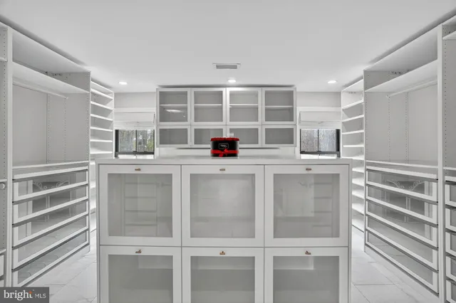 a living room with furniture and a gate