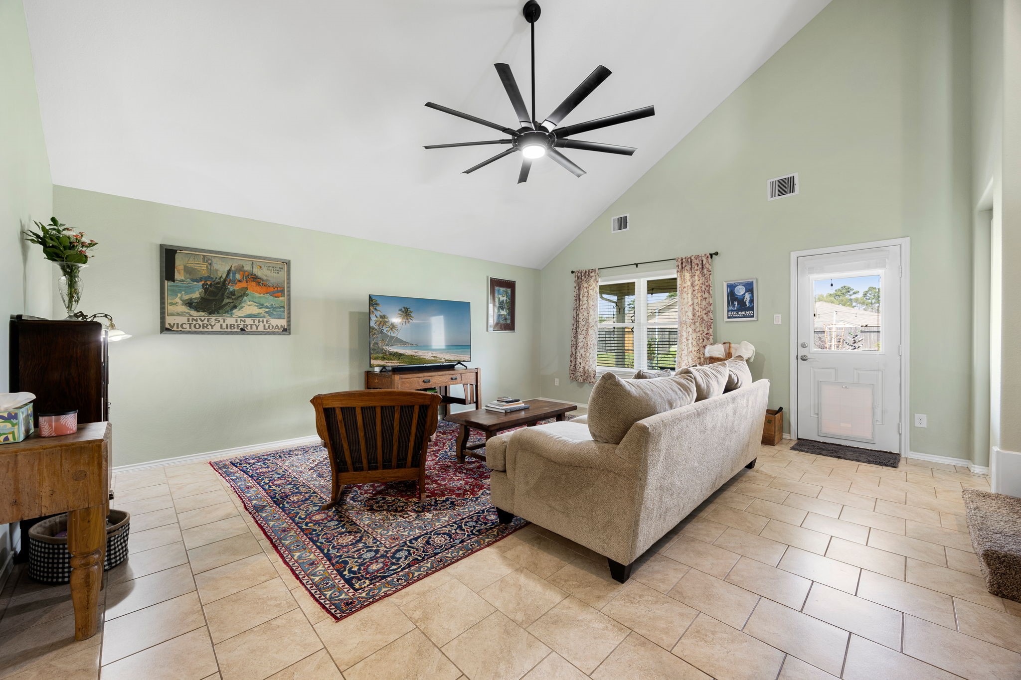 2627 Ski Lodge Drive Spring, TX 77373 - Photo 11 of 30 a living room with furniture and a flat screen tv