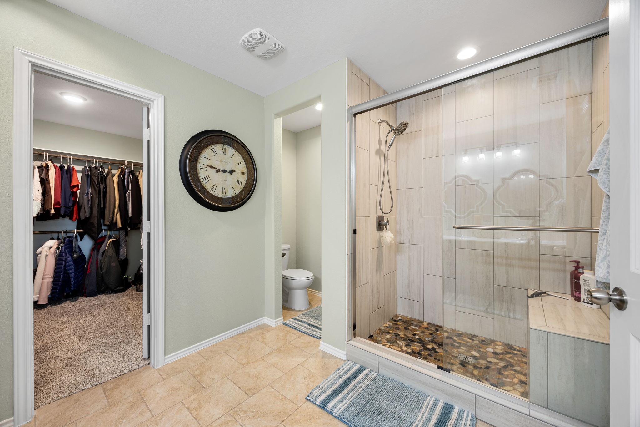 2627 Ski Lodge Drive Spring, TX 77373 - Photo 15 of 30 a bathroom with a large mirror a shower and a sink