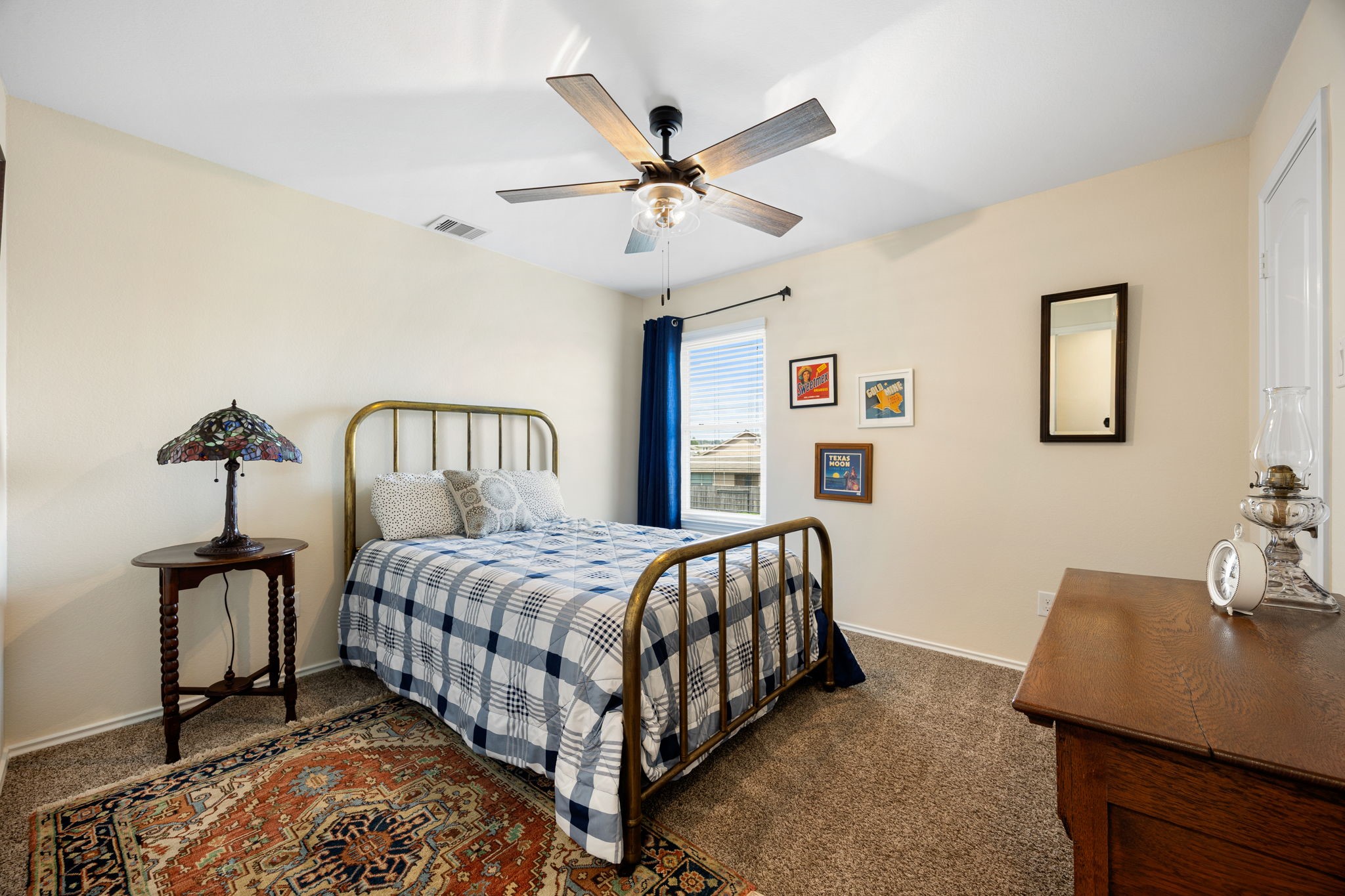 2627 Ski Lodge Drive Spring, TX 77373 - Photo 18 of 30 a bedroom with a bed and a table in it