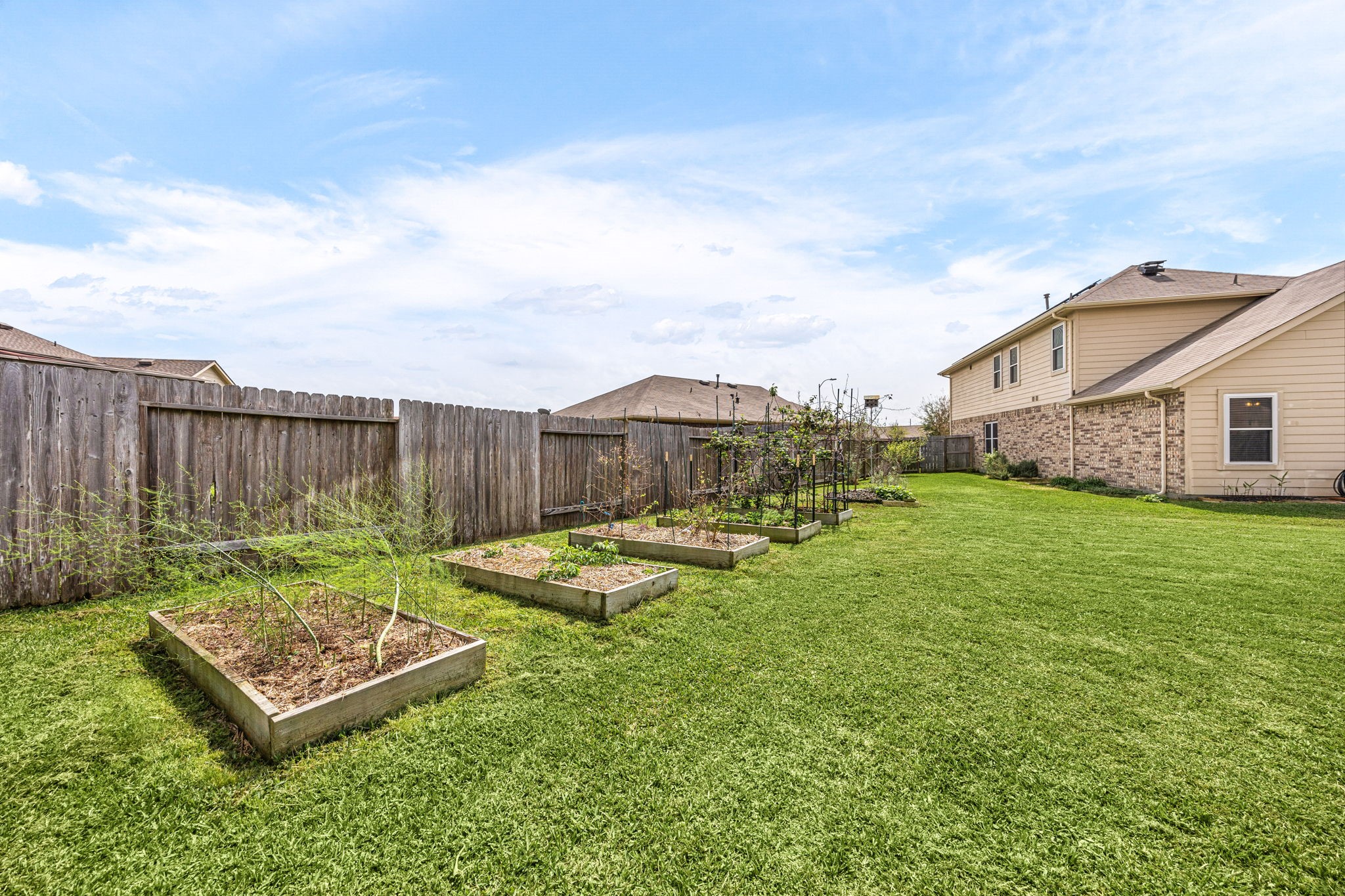 2627 Ski Lodge Drive Spring, TX 77373 - Photo 23 of 30 a view of a backyard with sitting area furniture and garden