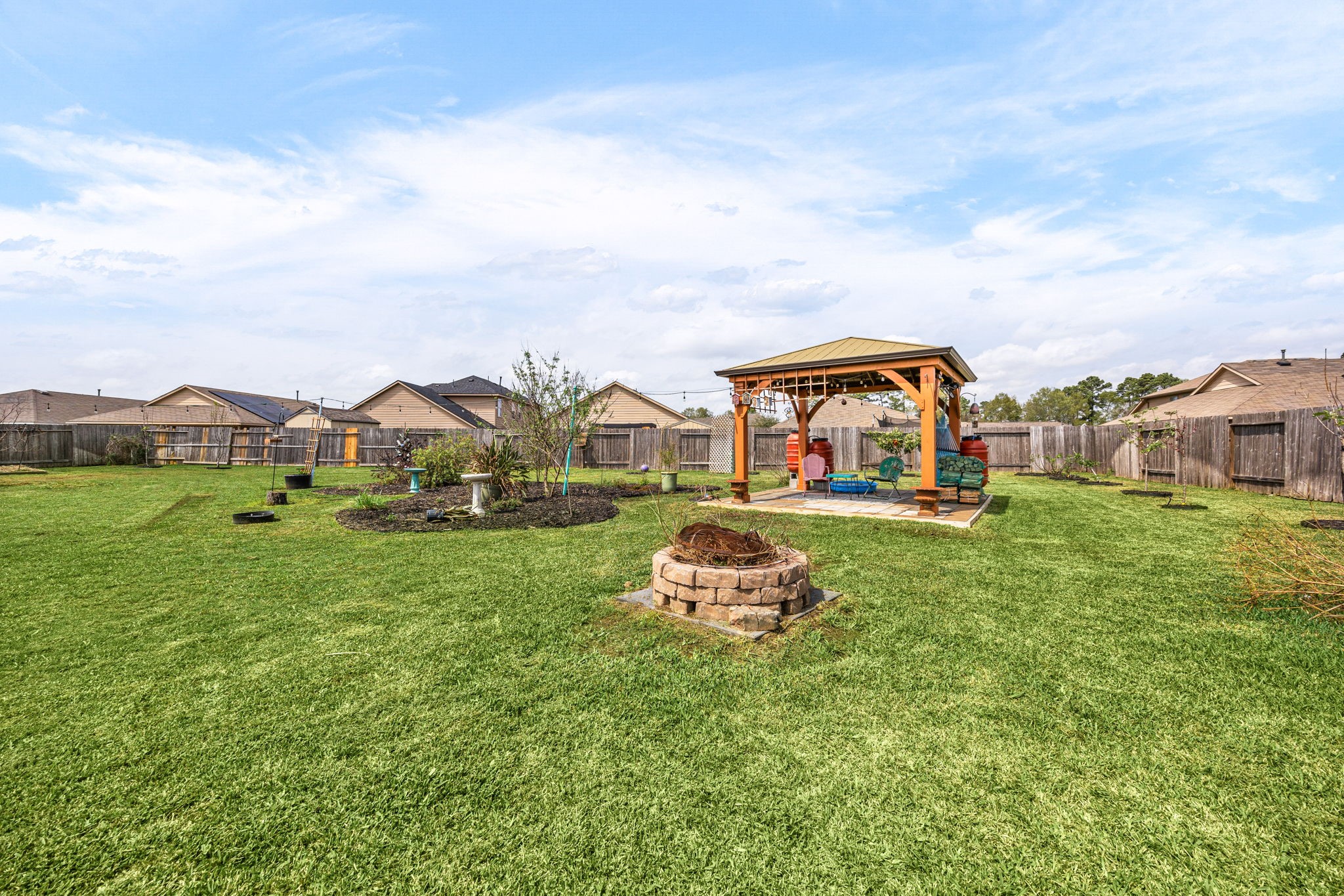 2627 Ski Lodge Drive Spring, TX 77373 - Photo 26 of 30 a front view of a house with garden