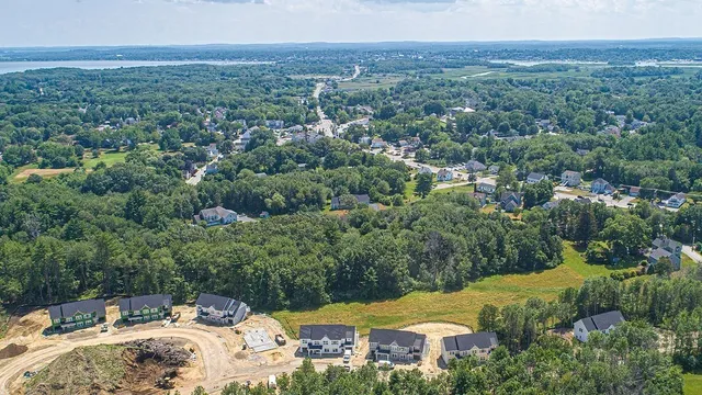 a view of a city with a lake