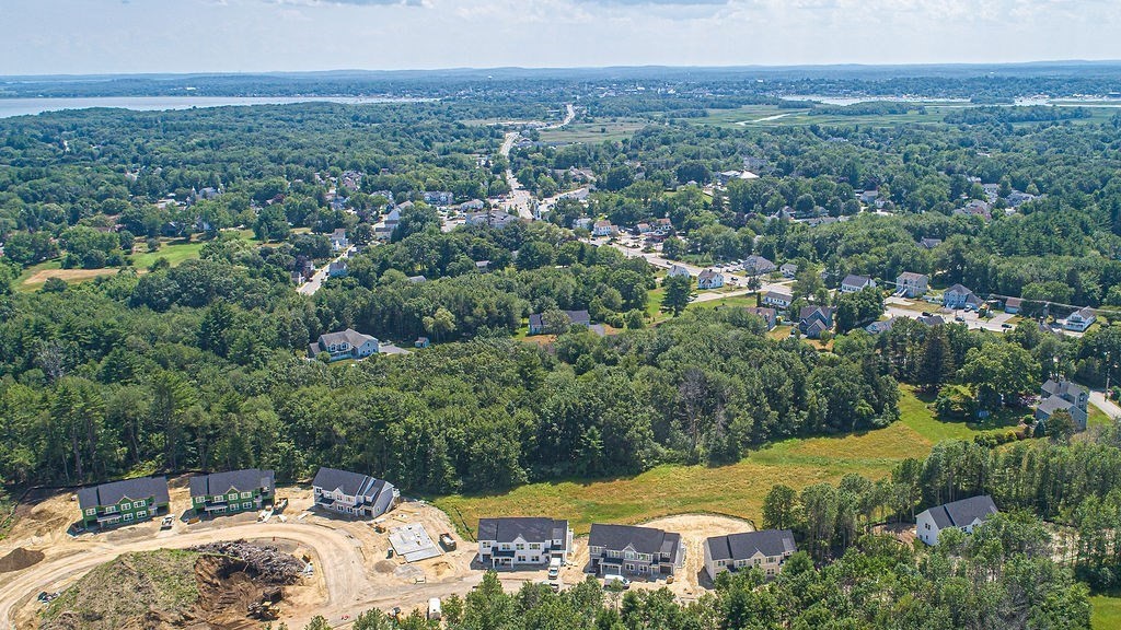 8 Meadowview Lane, Unit B Ipswich, MA 01938 - Photo 29 of 31 a view of a city with a lake