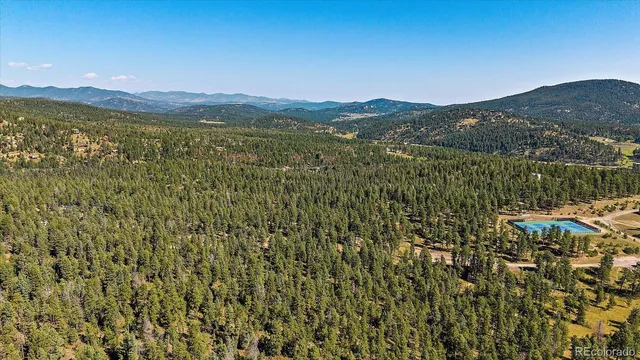 a view of lake with mountain