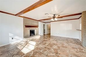 12415 Nova Drive Houston, TX 77077 - Photo 5 of 16 a view of a livingroom with a fireplace and a ceiling fan