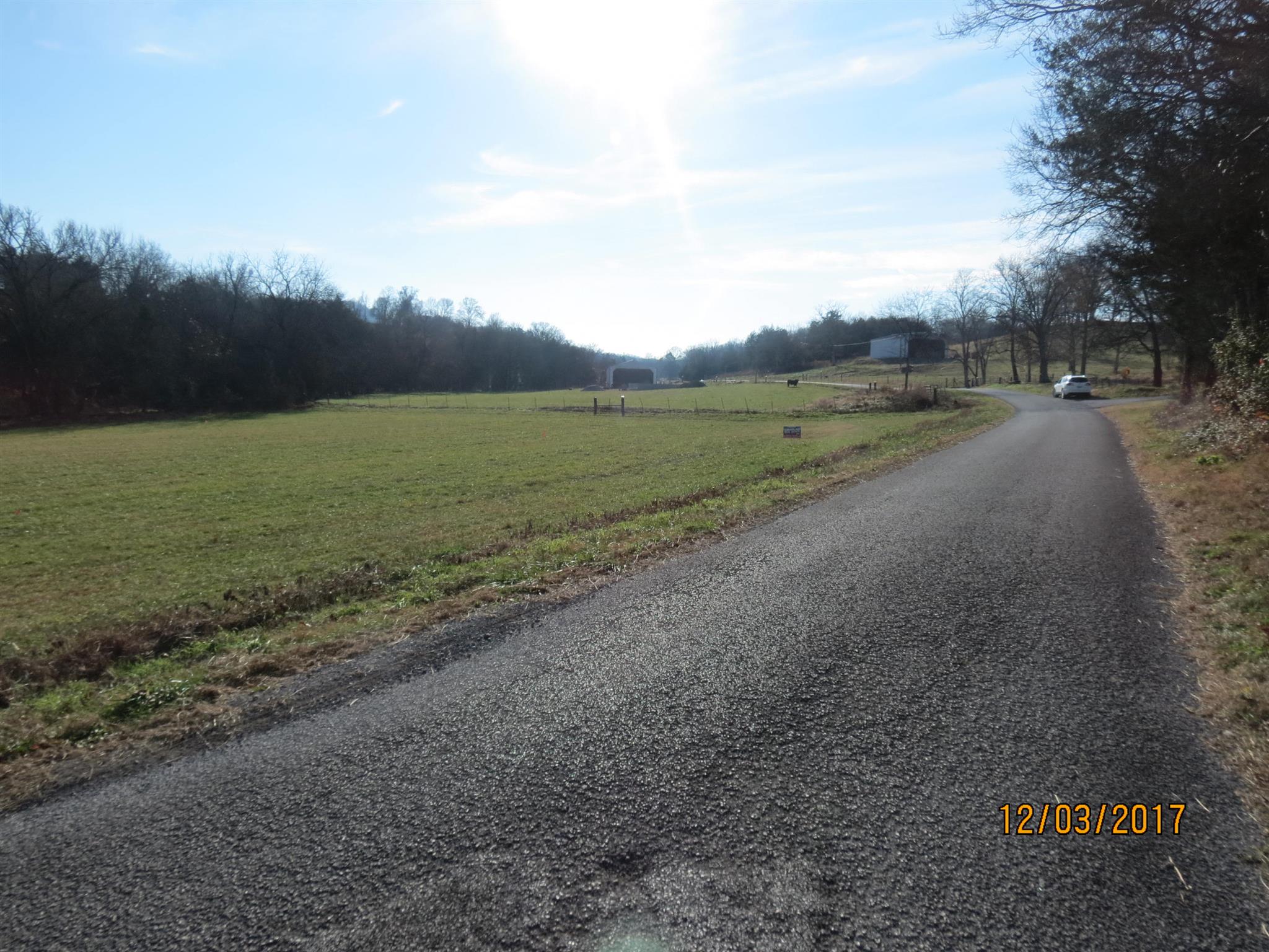 1 Tramel Branch Road Liberty, TN 37095 - Photo 6 of 6 a view of a road with a yard