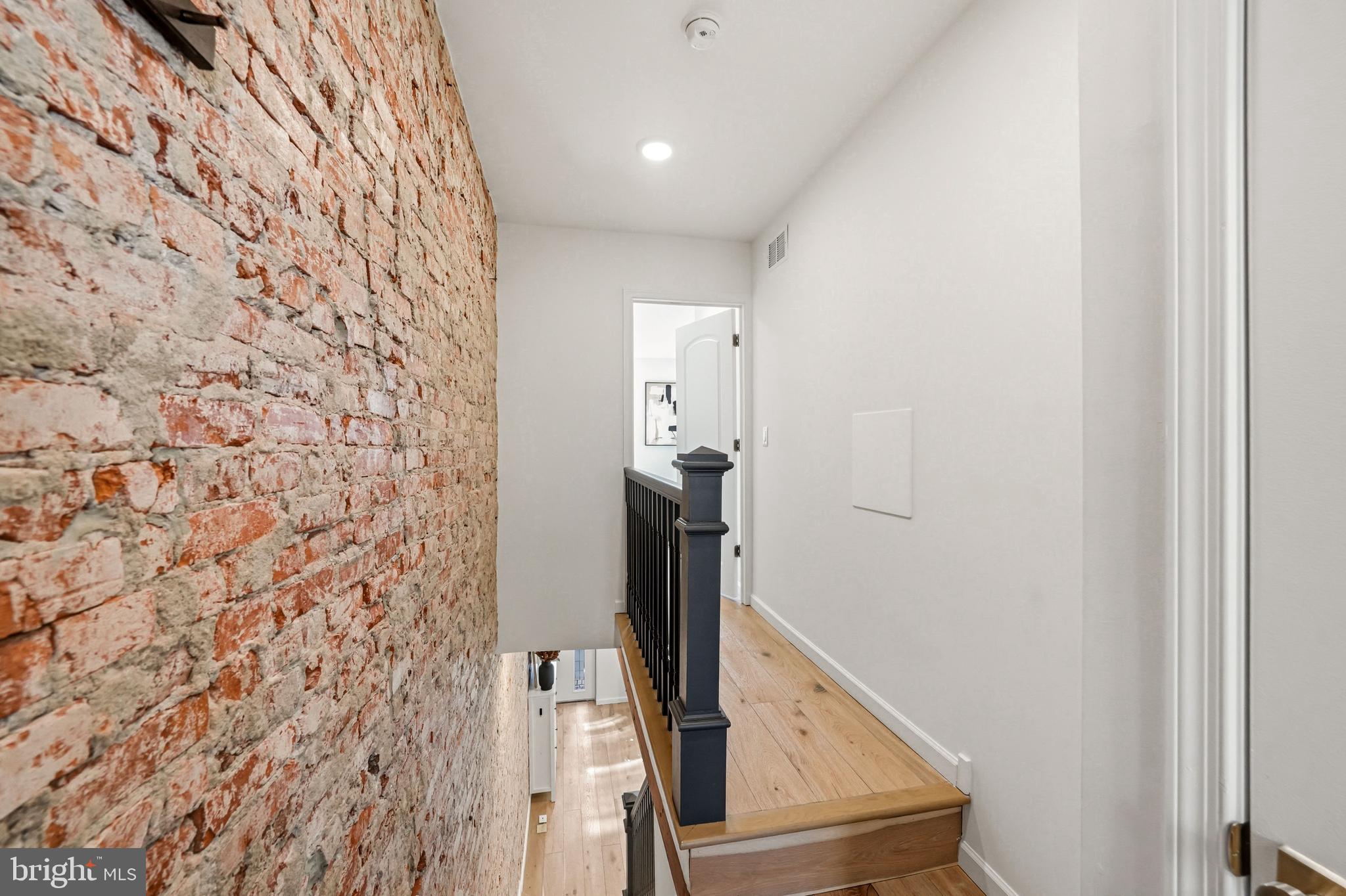 831 North Stillman Street Philadelphia, PA 19130 - Photo 20 of 35 a view of a hallway with wooden floor and entryway