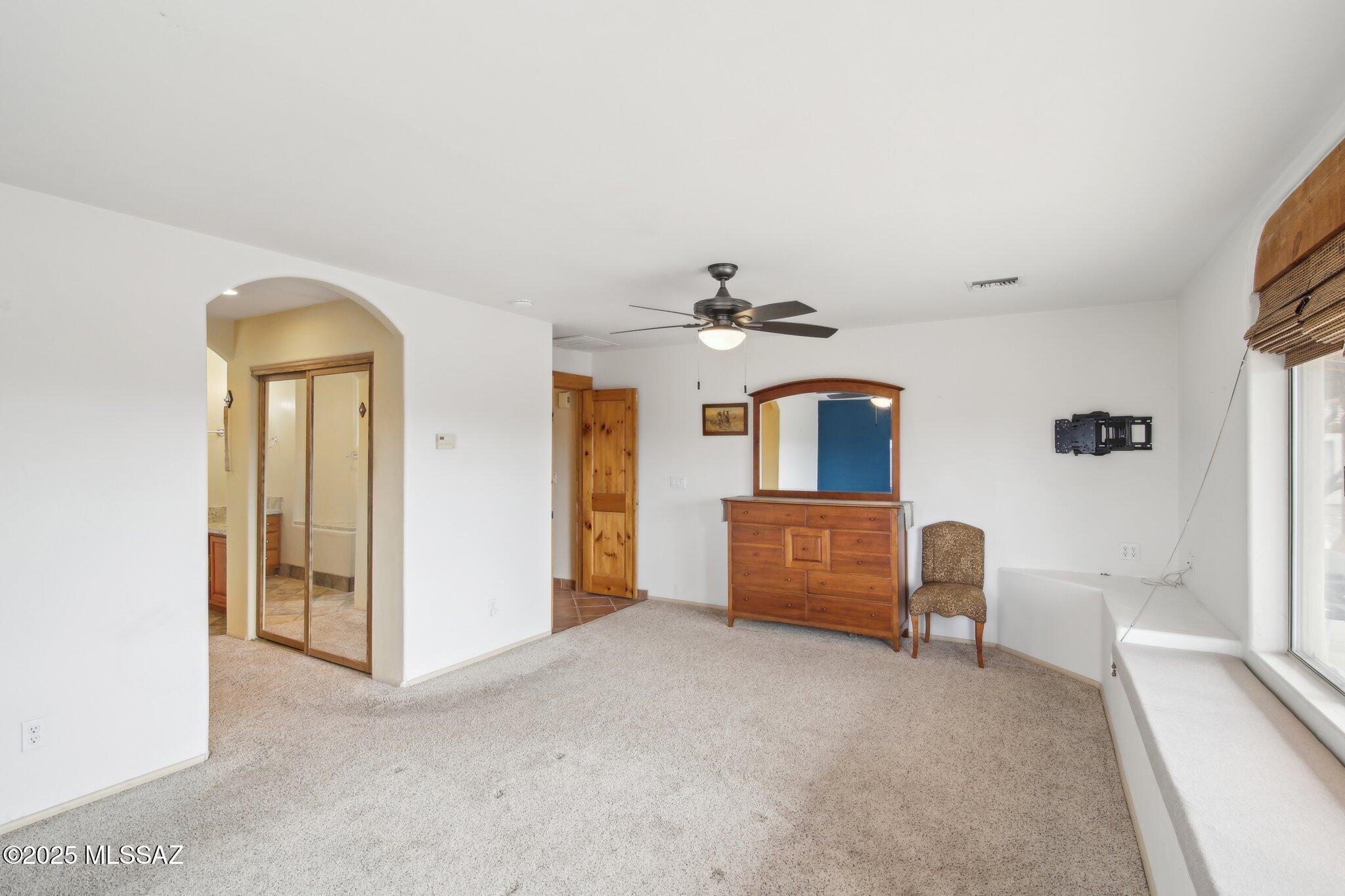351 Camino Canoa Rio Rico, AZ 85648 - Photo 19 of 34 a bedroom with furniture and window