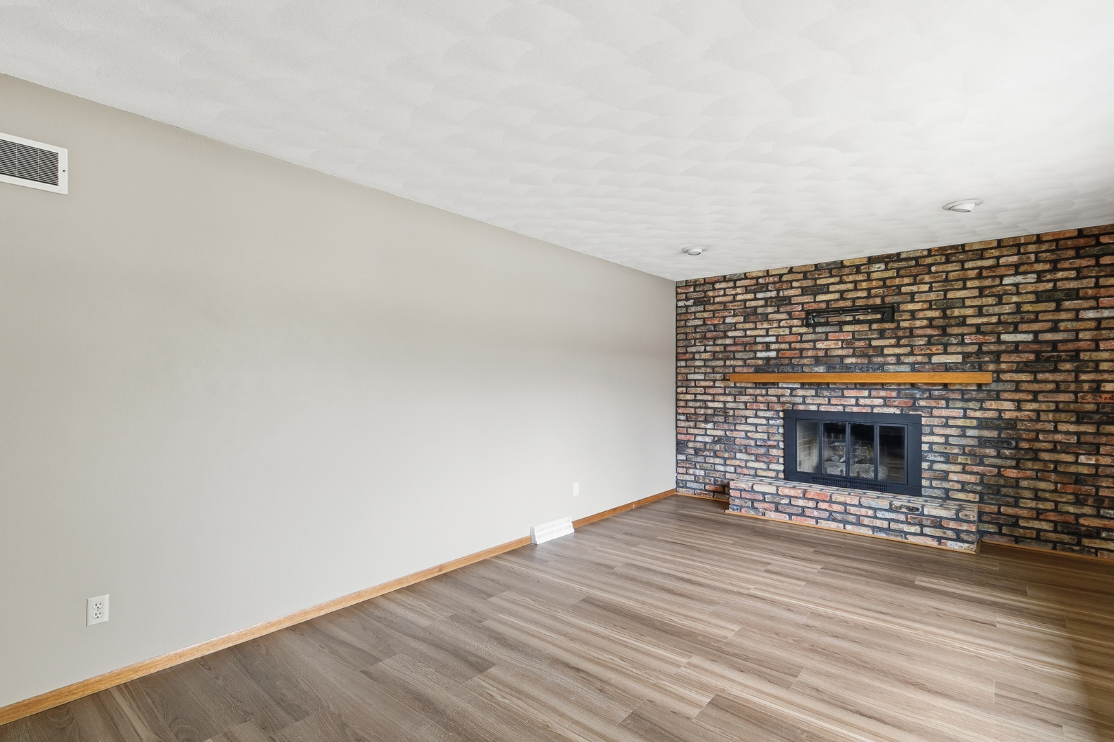 3503 32nd Street Moline, IL 61265 - Photo 16 of 32 a view of an empty room and wooden floor