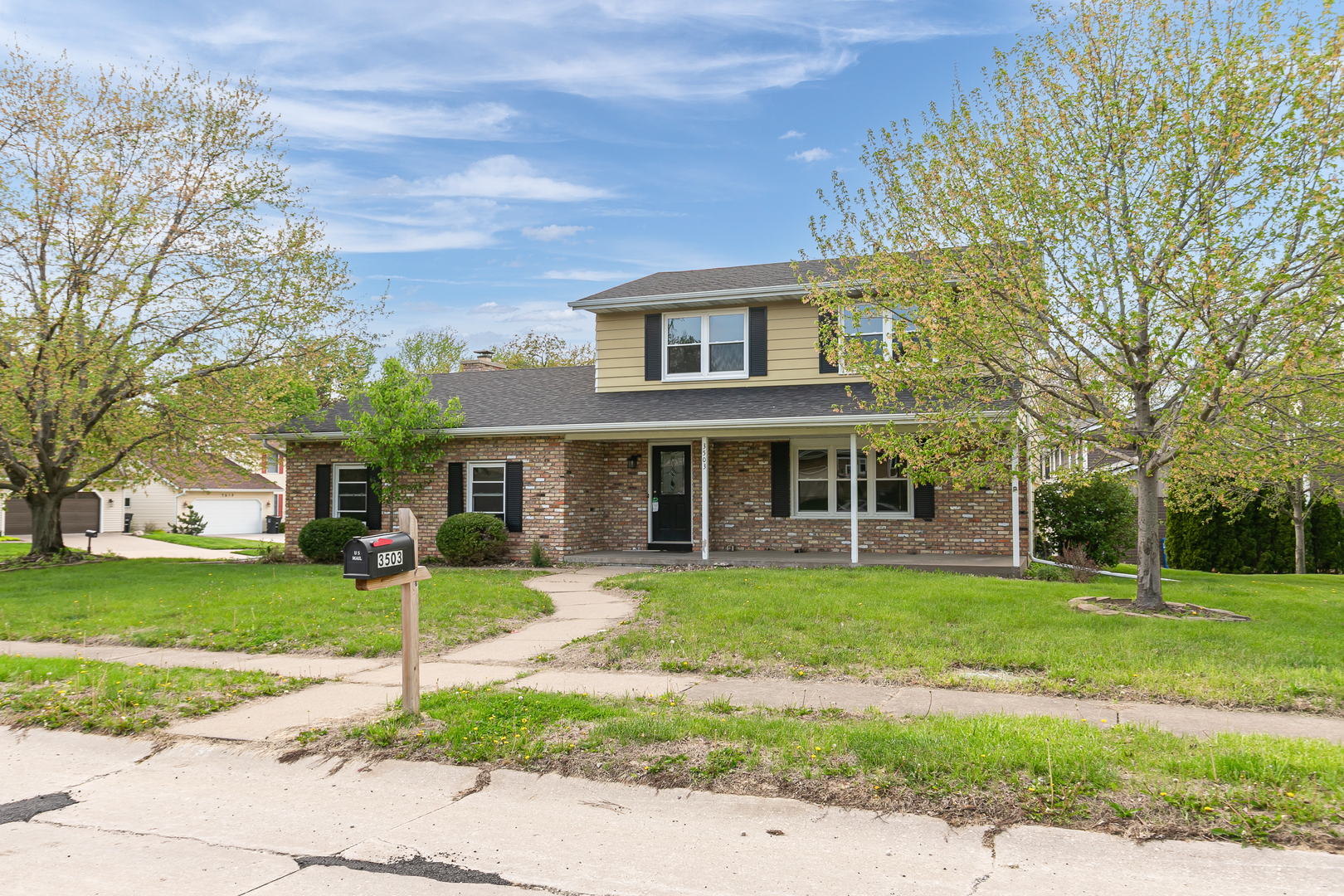 3503 32nd Street Moline, IL 61265 - Photo 2 of 32 a front view of a house with a yard