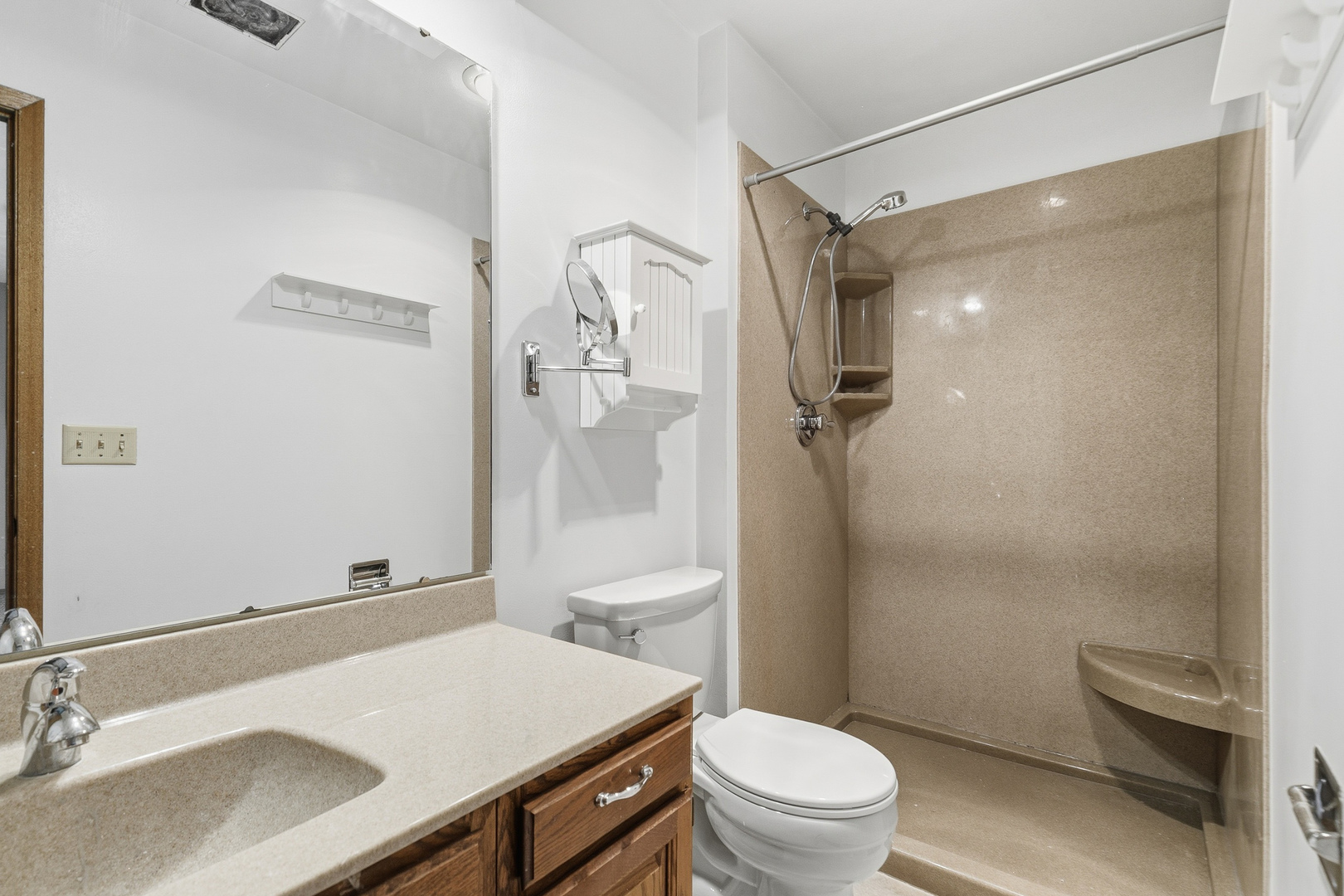 3503 32nd Street Moline, IL 61265 - Photo 22 of 32 a bathroom with a sink toilet vanity and shower