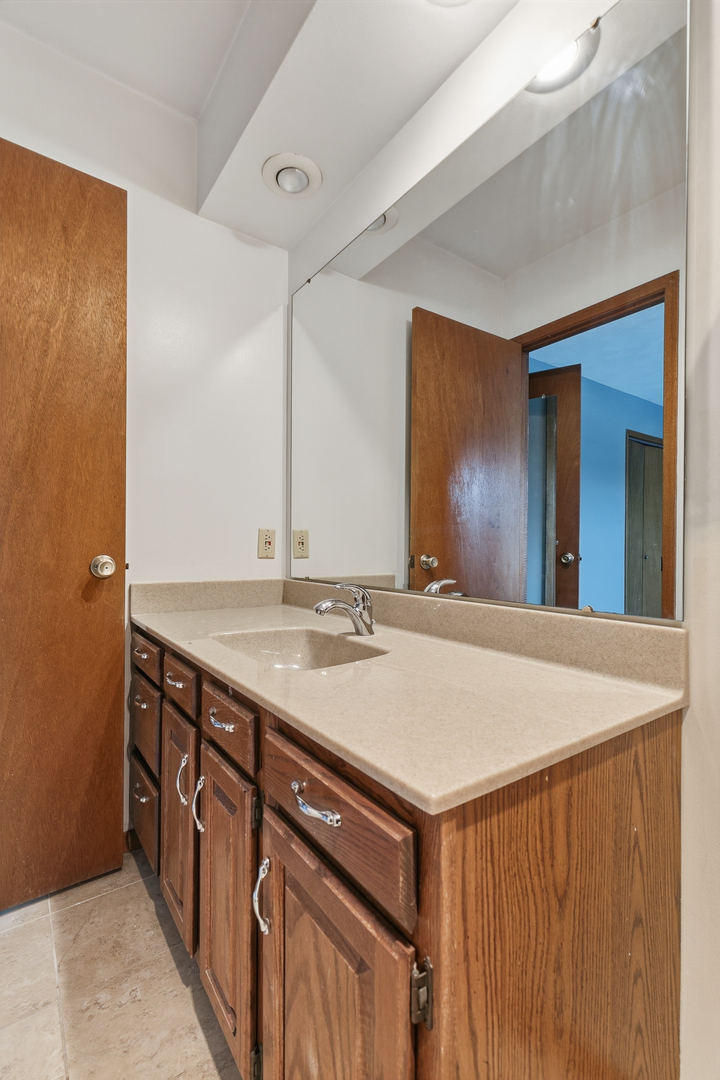 3503 32nd Street Moline, IL 61265 - Photo 23 of 32 a room with a sink and a refrigerator