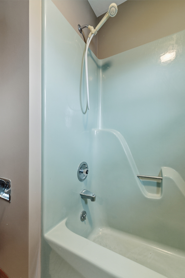 3503 32nd Street Moline, IL 61265 - Photo 29 of 32 a bathroom with a shower and a sink
