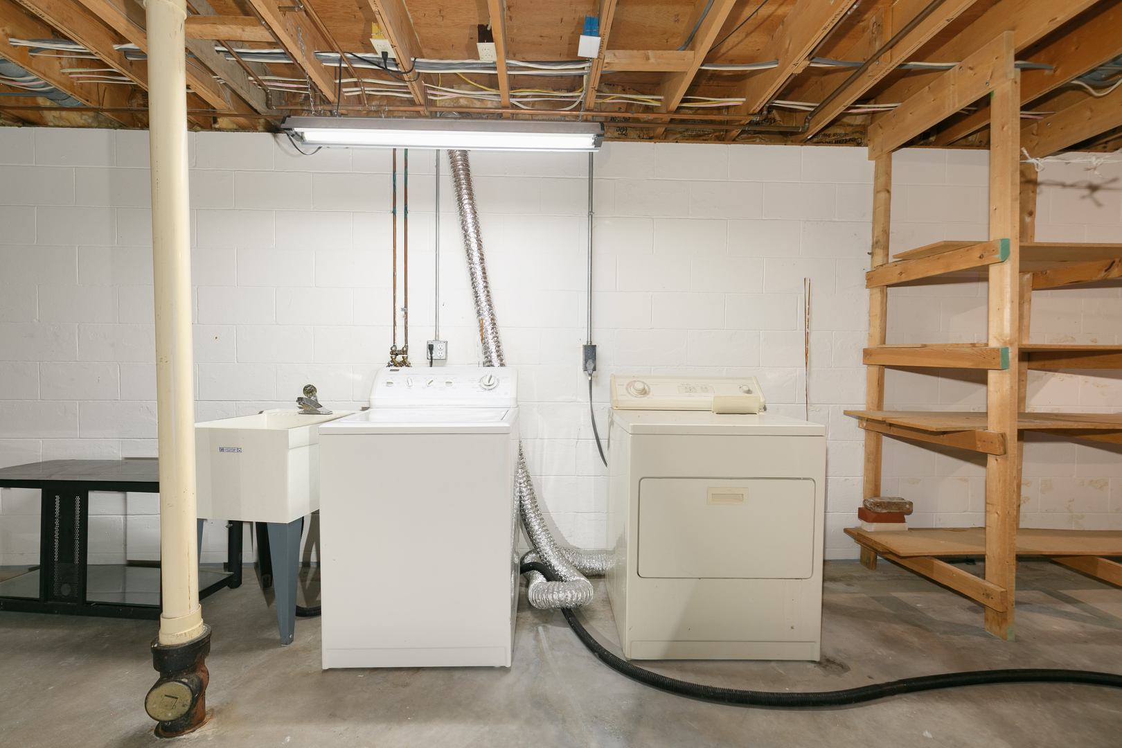 3503 32nd Street Moline, IL 61265 - Photo 32 of 32 a view of storage and utility room with two washing machine