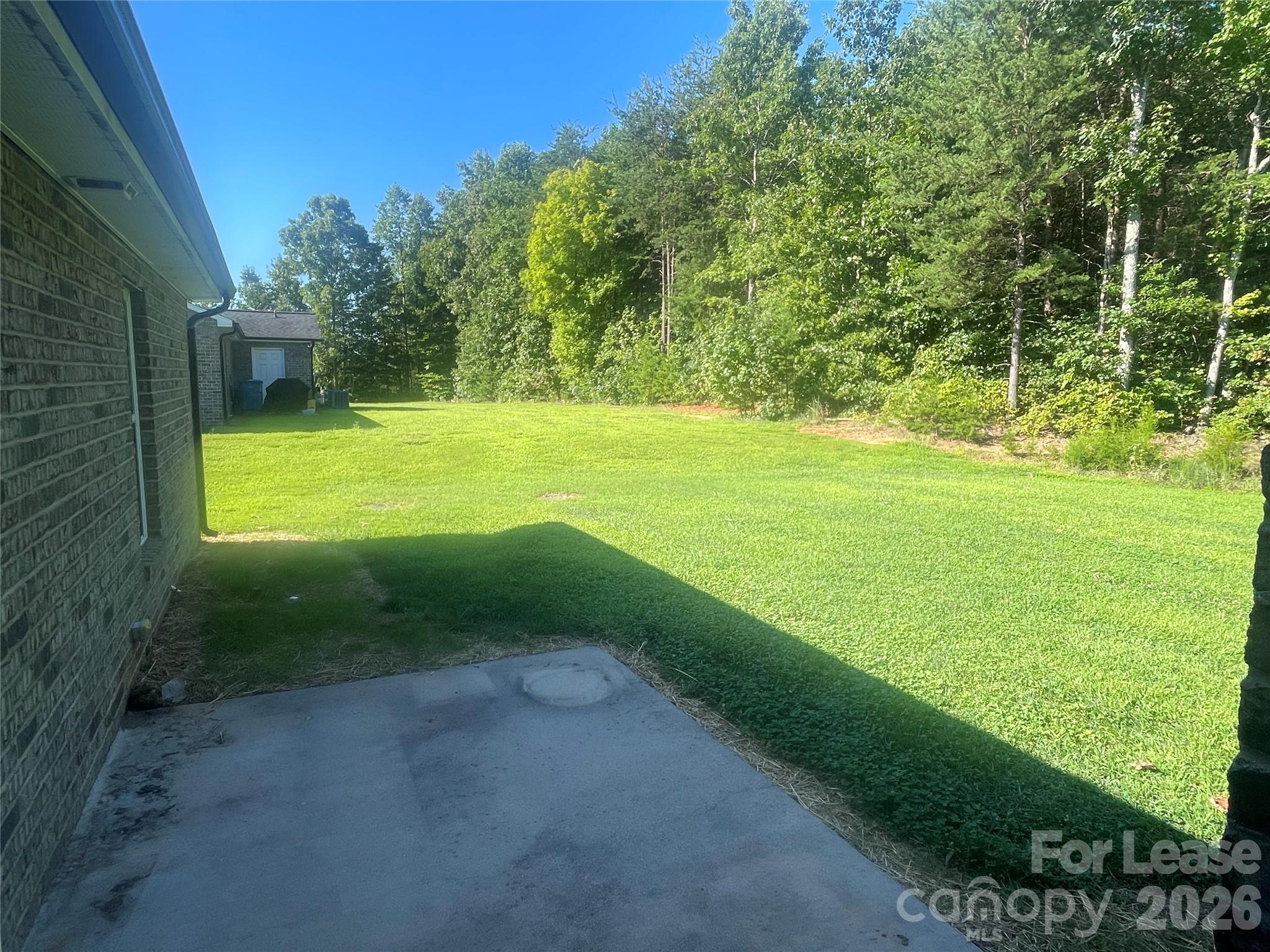 3791 Lee Moore Road Maiden, NC 28650 - Photo 11 of 11 a view of yard with swimming pool and green space
