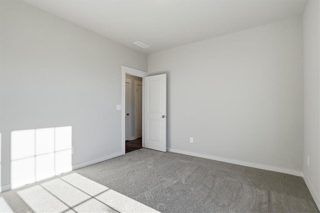 4057 Links Boulevard Jefferson, GA 30549 - Photo 21 of 58 a view of an empty room and window