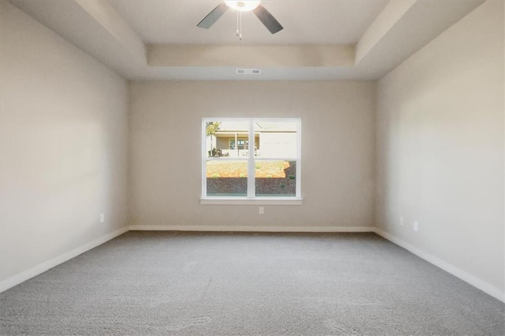 4057 Links Boulevard Jefferson, GA 30549 - Photo 28 of 58 an empty room with a window
