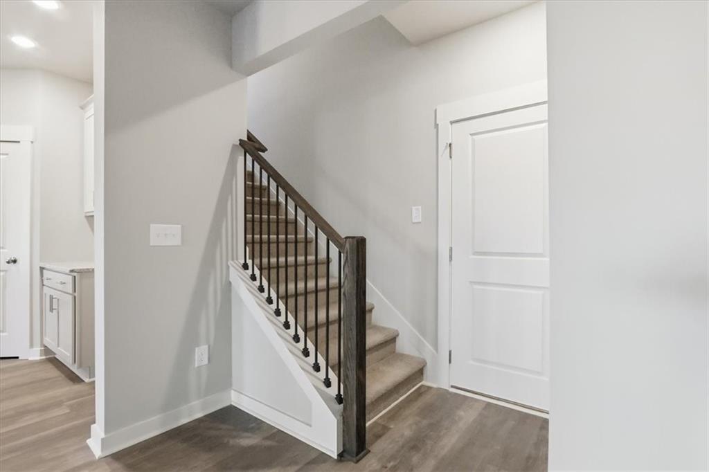 4057 Links Boulevard Jefferson, GA 30549 - Photo 40 of 58 a view of a hallway with staircase