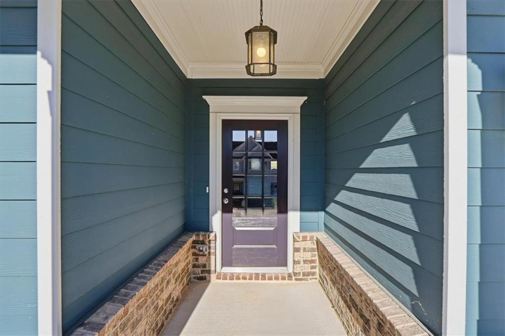 4057 Links Boulevard Jefferson, GA 30549 - Photo 4 of 58 a view of staircase with white walls and a window