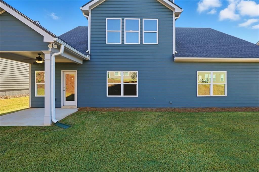 4057 Links Boulevard Jefferson, GA 30549 - Photo 49 of 58 a view of front of a house with a yard