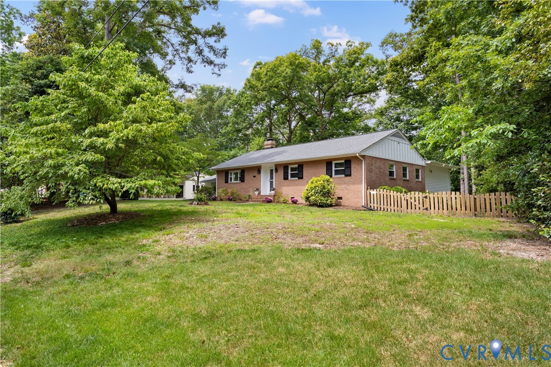 3136 Old Quarry Road Richmond, VA 23225 - Photo 7 of 39 Brick ranch home featuring a gray shingle roof, bl