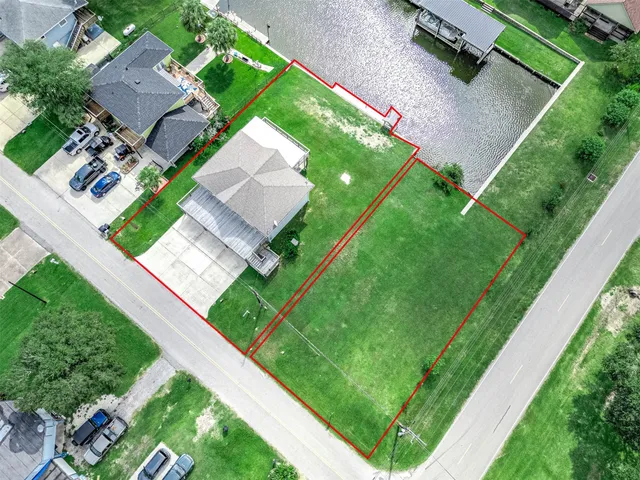 a view of a house with a yard porch and sitting area