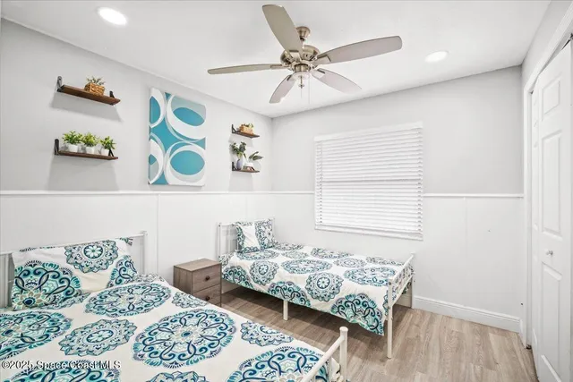 a bedroom with furniture and a window