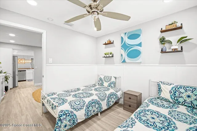 a bedroom with a bed and a couch