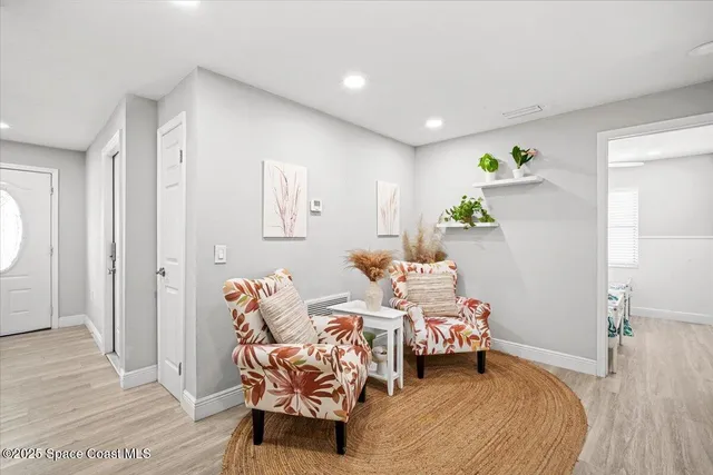 a bedroom with bed and a couch