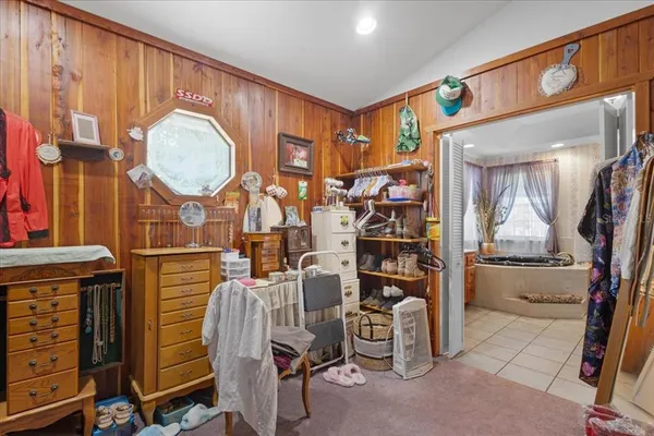 a bathroom with a double vanity sink mirror and toilet