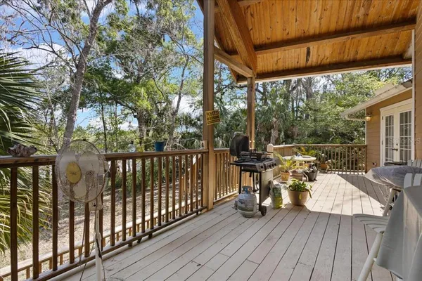 a view of a two chairs on the deck