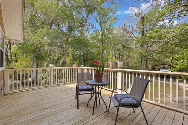 a view of balcony with furniture
