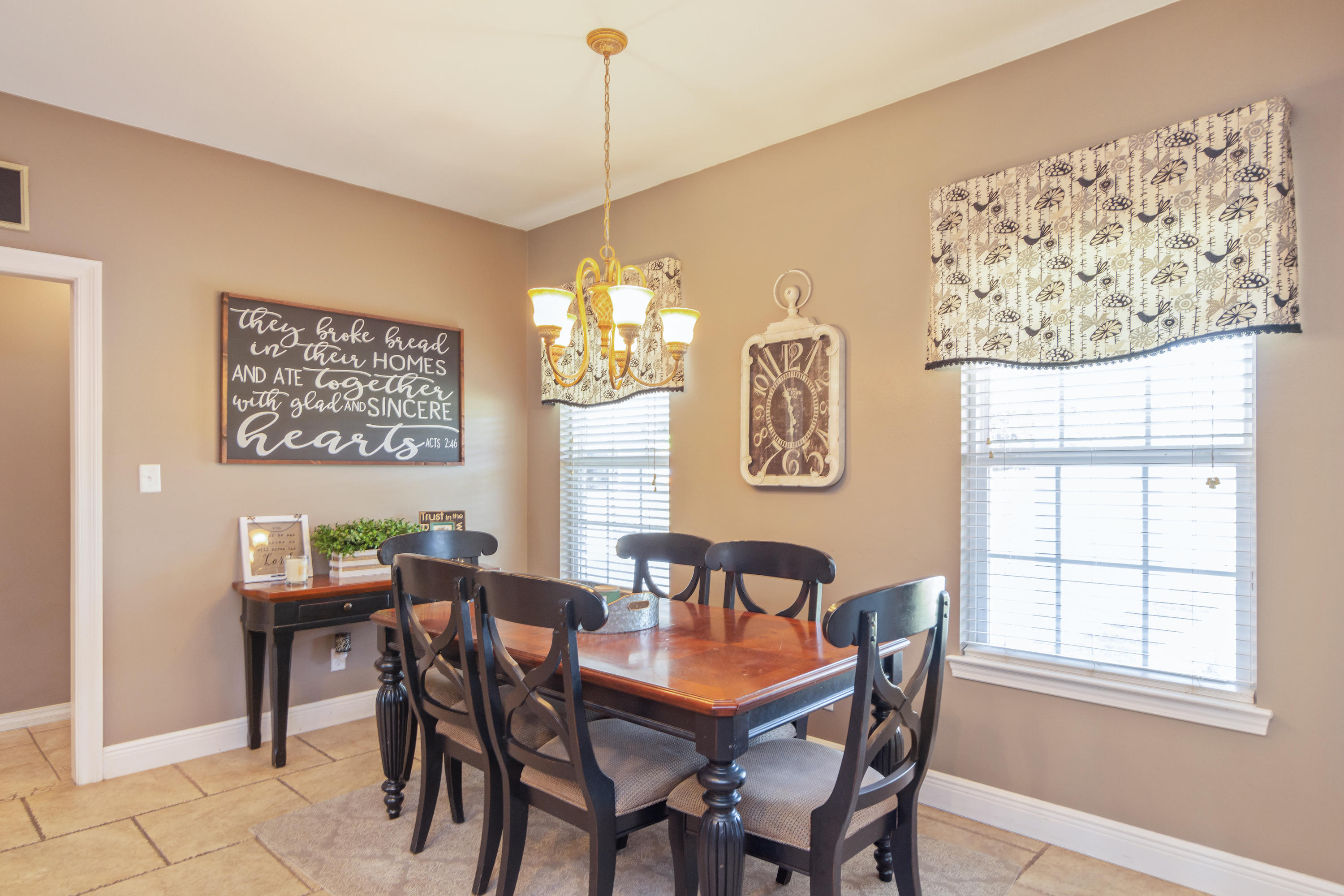 5803 Bush Road Baker, FL 32531 - Photo 15 of 34 a view of a dining room with furniture window and outside view
