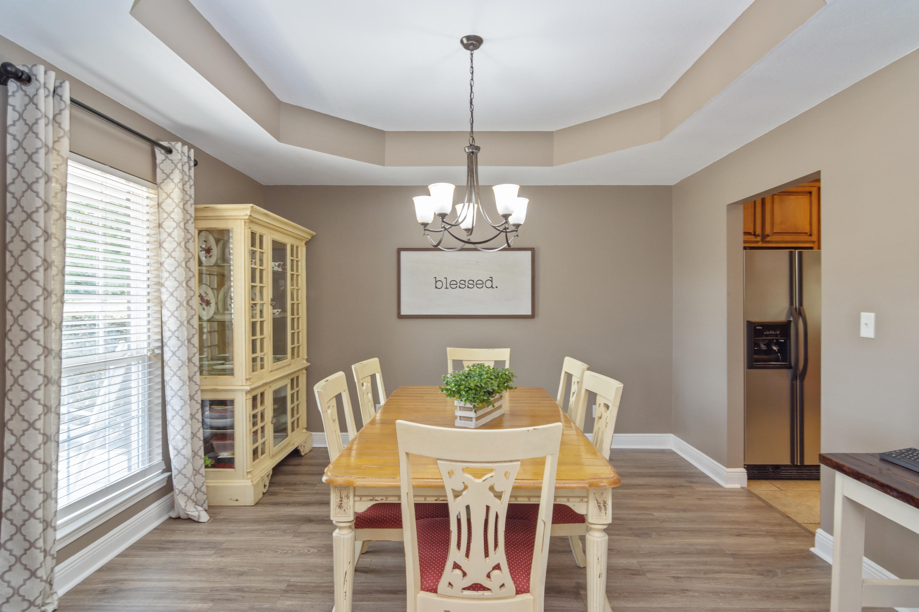 5803 Bush Road Baker, FL 32531 - Photo 17 of 34 a view of a dining room with furniture window and wooden floor