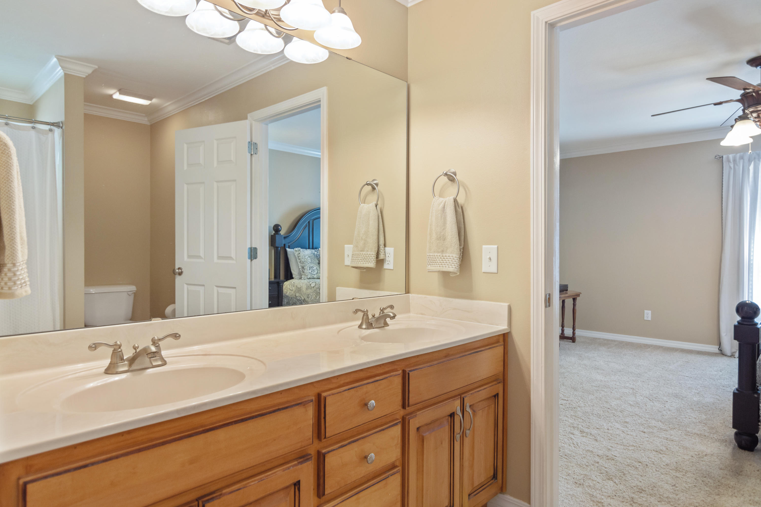 5803 Bush Road Baker, FL 32531 - Photo 22 of 34 a bathroom with a sink double vanity and a mirror