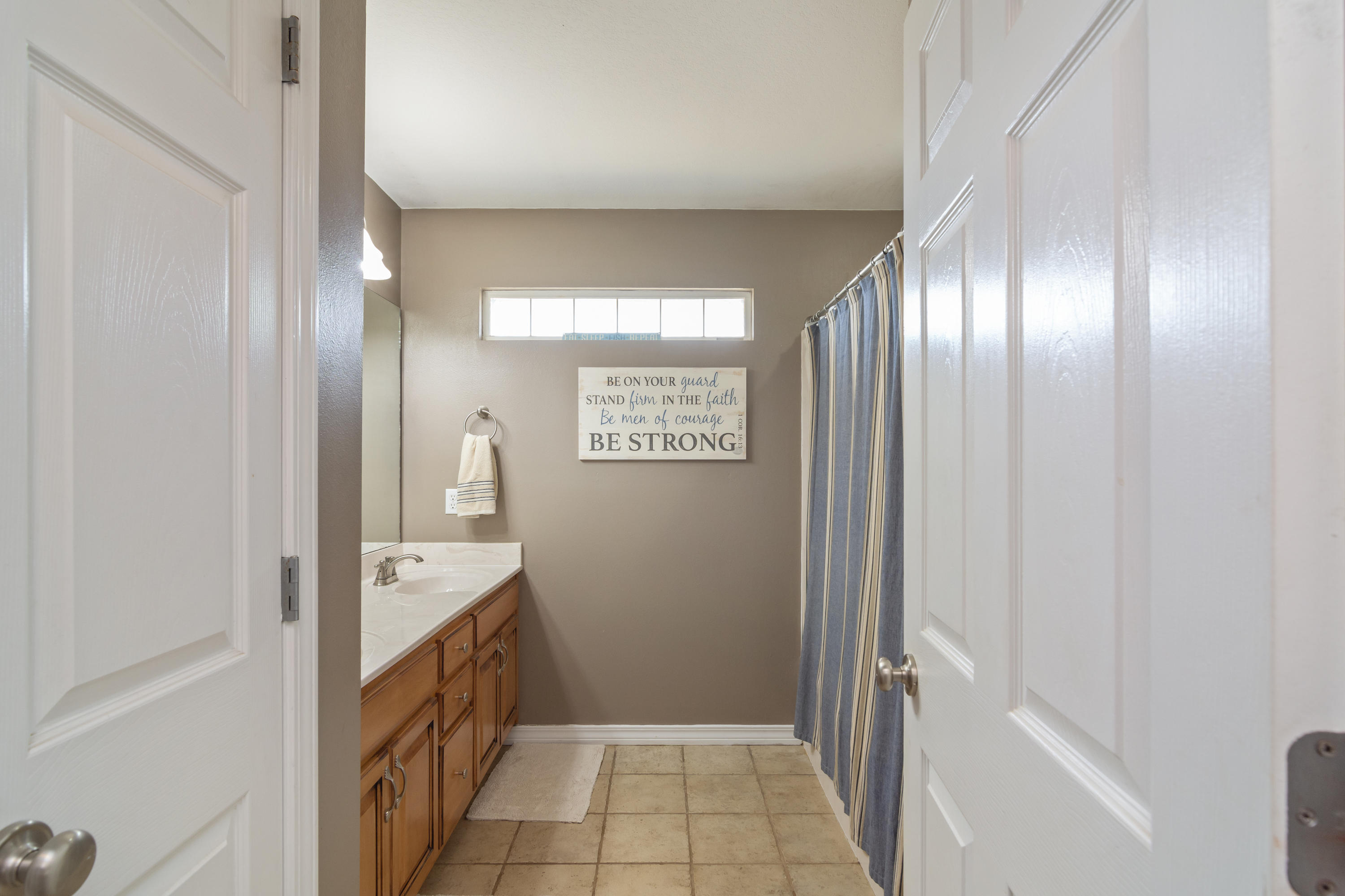 5803 Bush Road Baker, FL 32531 - Photo 27 of 34 a bathroom with a bathtub and shower