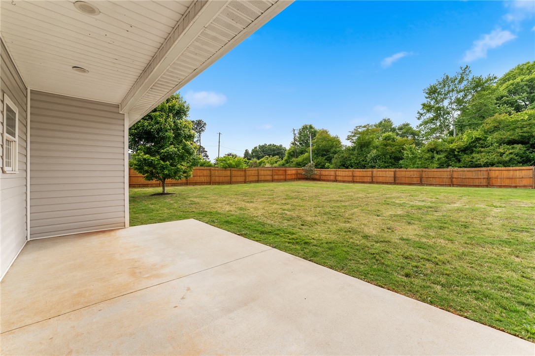 1411 Dunn Road Anderson, SC 29625 - Photo 27 of 30 This spacious backyard with a private fence offers an ideal setting for outdoor living.