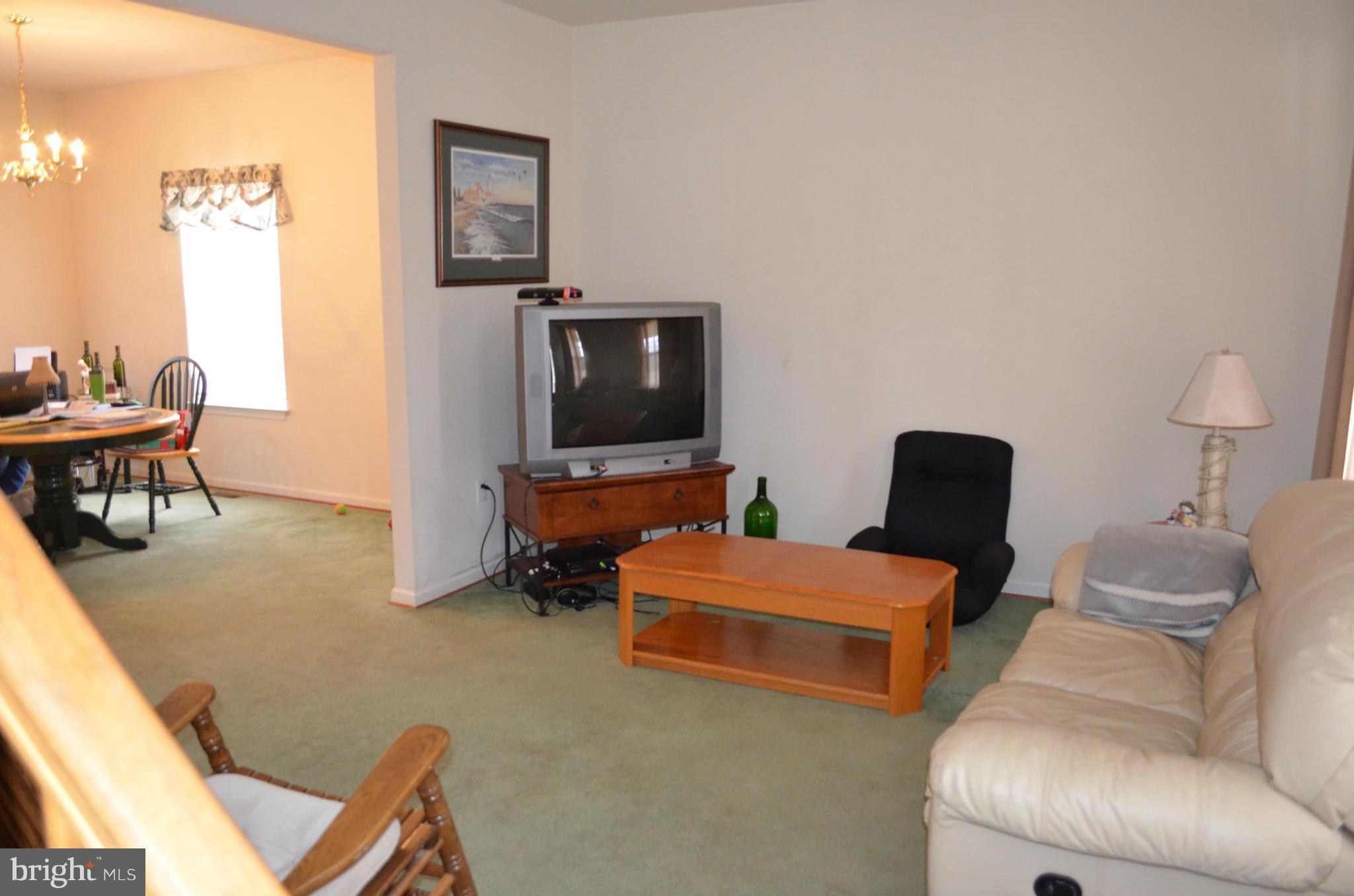 4570 Mattapany Road St. Leonard, MD 20685 - Photo 14 of 28 Living Room opens to the Dining Room