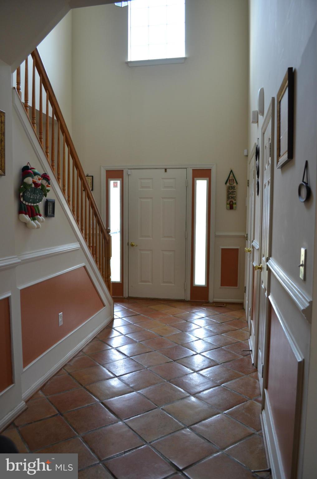 4570 Mattapany Road St. Leonard, MD 20685 - Photo 3 of 28 Foyer with terracotta tile floor