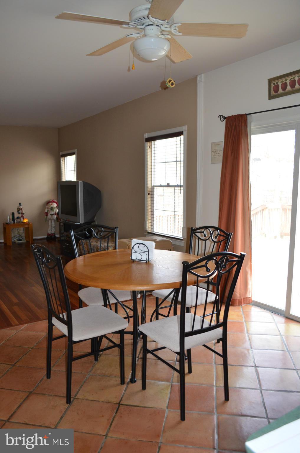 4570 Mattapany Road St. Leonard, MD 20685 - Photo 8 of 28 Breakfast Room with Sliders to the Huge Deck.