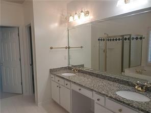 3715 Ridgeside Court Suwanee, GA 30024 - Photo 30 of 44 a bathroom with a granite countertop sink and a mirror