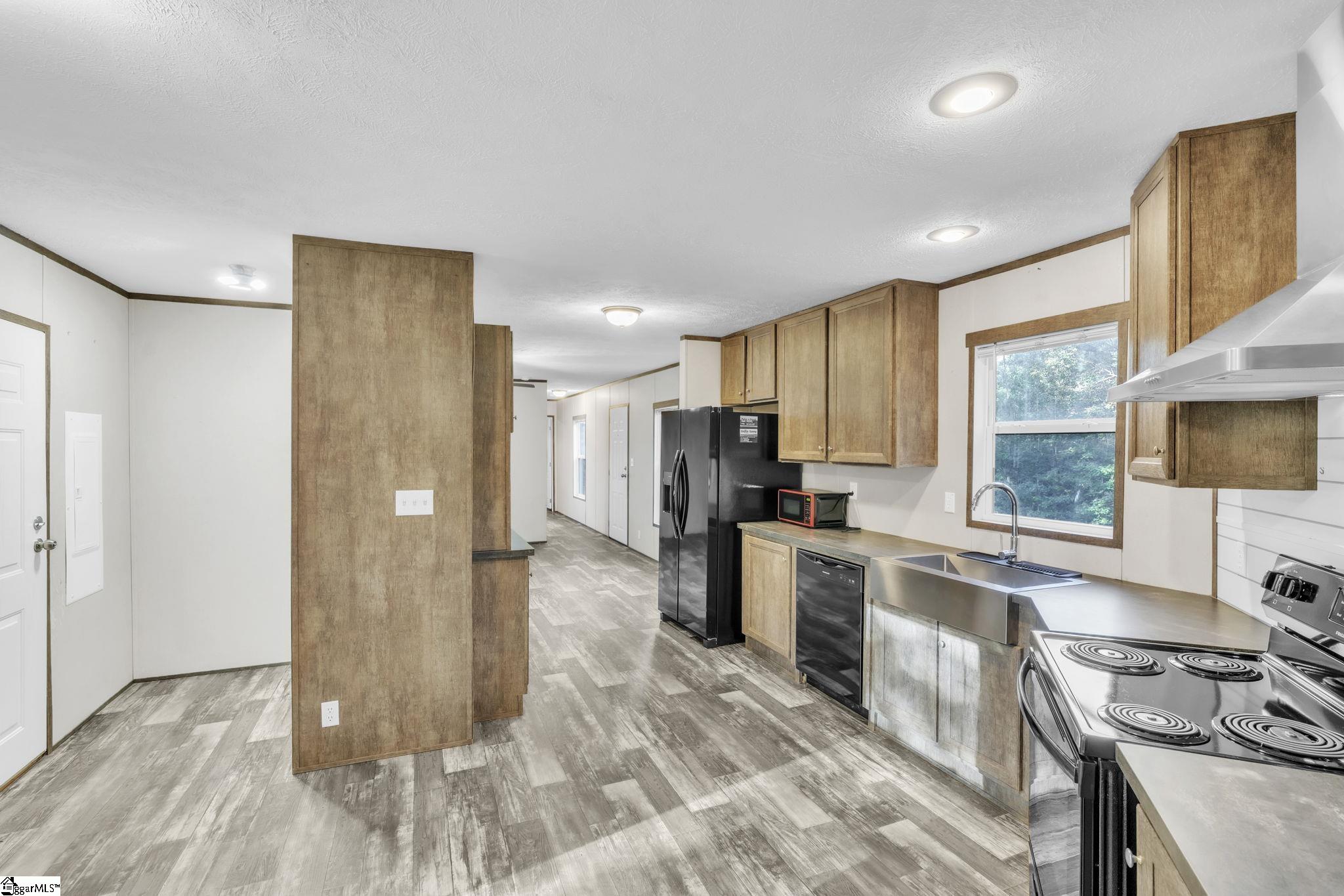 145 Bellwood Road Pickens, SC 29671 - Photo 7 of 22 Exterior Door to the left goes to porch. In-Kitchen Dining space in kitchen