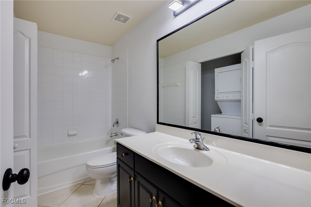 9470 Ivy Brook Run, Unit 805 Fort Myers, FL 33913 - Photo 15 of 31 a bathroom with a sink and a toilet