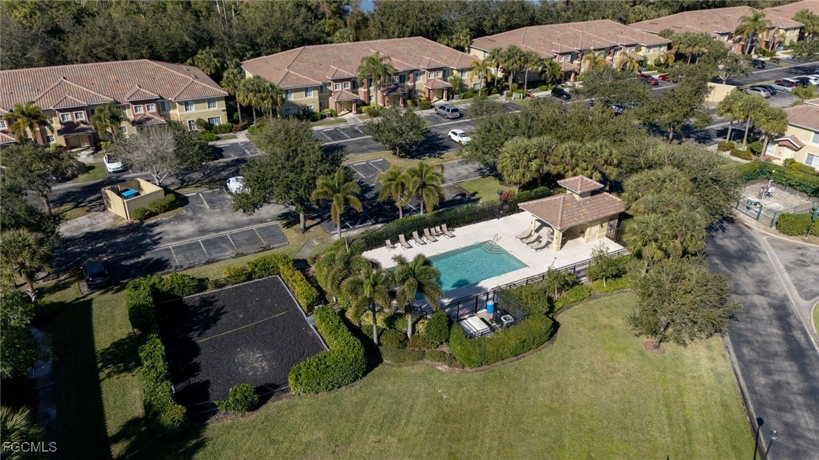 9470 Ivy Brook Run, Unit 805 Fort Myers, FL 33913 - Photo 22 of 31 an aerial view of a houses with outdoor space