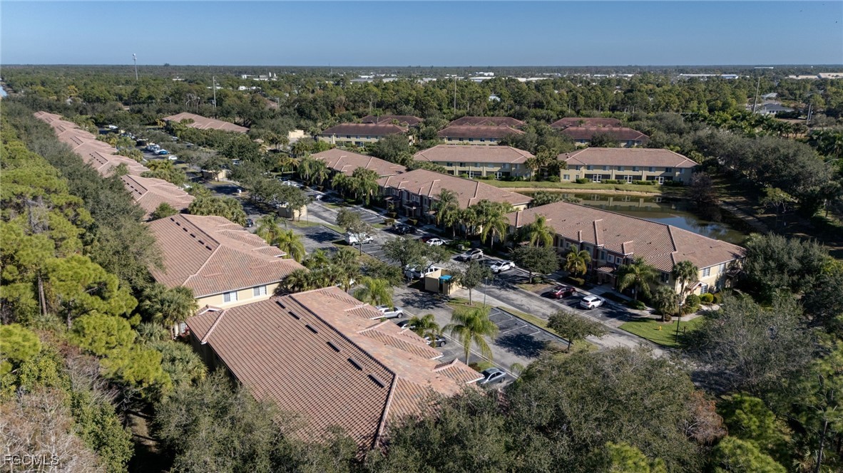 9470 Ivy Brook Run, Unit 805 Fort Myers, FL 33913 - Photo 26 of 31 an aerial view of multiple house