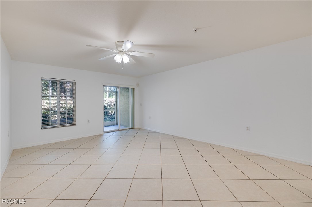 9470 Ivy Brook Run, Unit 805 Fort Myers, FL 33913 - Photo 6 of 31 a view of an empty room with a window