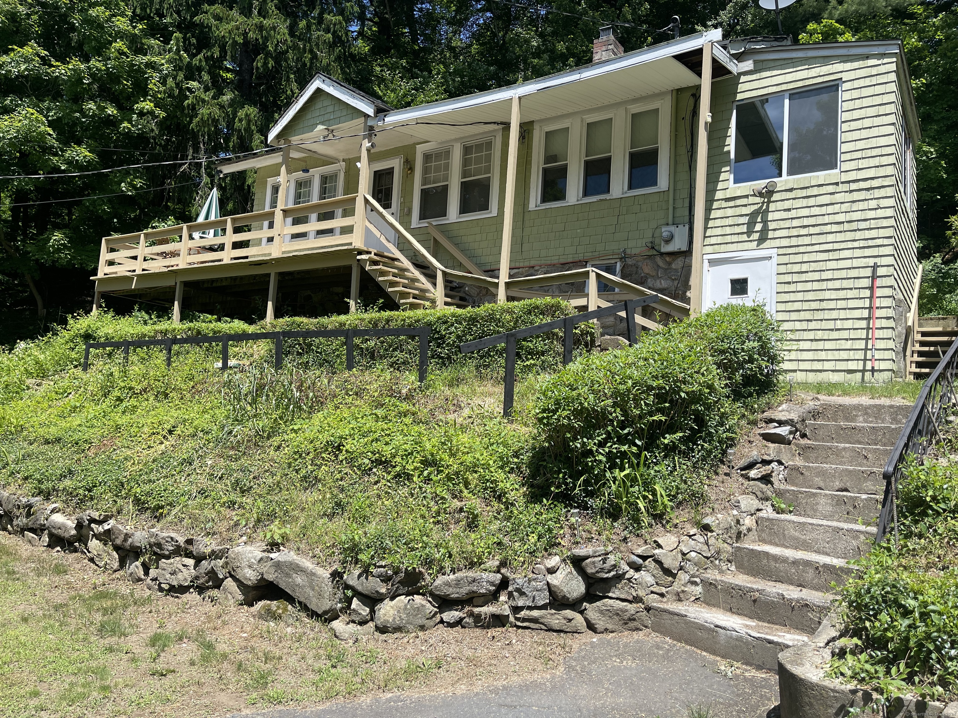 78 Grant Road Bethany, CT 06524 - Photo 1 of 1 a front view of a house with a yard