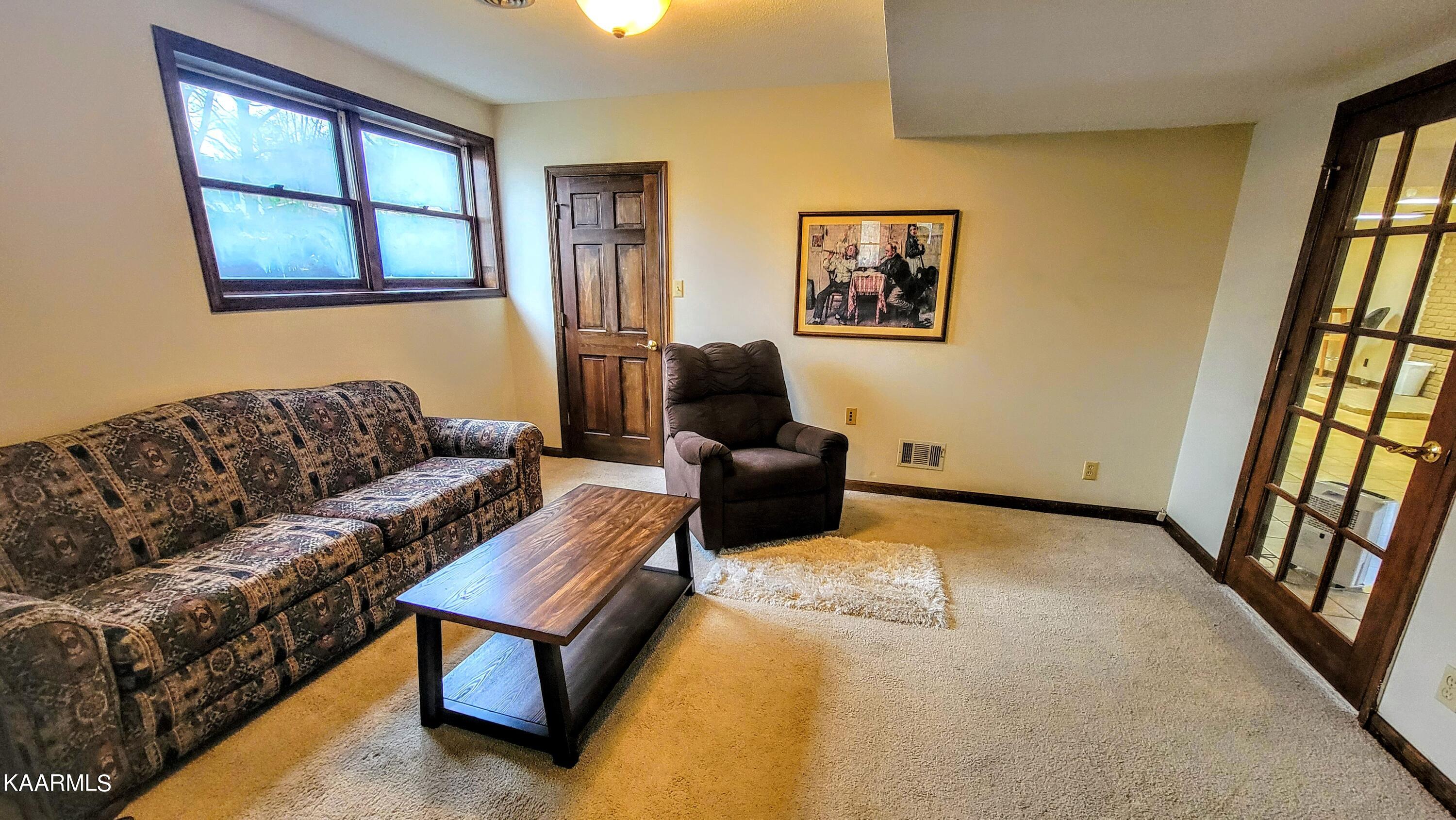 109 Clifton Circle Oak Ridge, TN 37830 - Photo 29 of 36 Lower Sitting Room